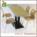 快餐厅桌椅一桌四椅组合 梯形铸铁台脚 钢木结构餐桌椅定做 质保两年